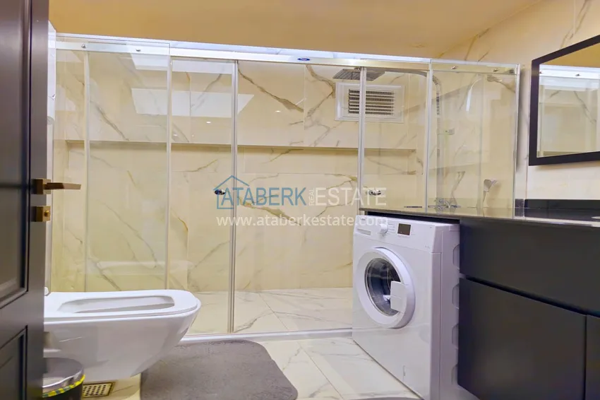 Приобрести Квартира 1+1 с мебелью в Махмутларе — 150 м от моря, проспект Барбаросса 14 