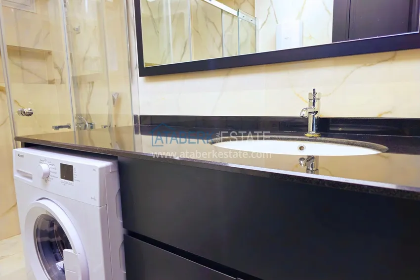 Приобрести Квартира 1+1 с мебелью в Махмутларе — 150 м от моря, проспект Барбаросса 15 