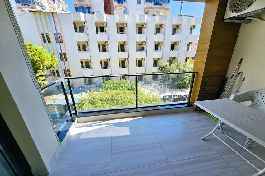 Приобрести Квартира 1+1 с мебелью в Махмутларе — 150 м от моря, проспект Барбаросса 16 