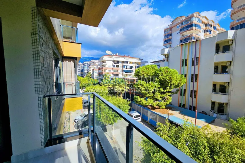 Приобрести Квартира 1+1 с мебелью в Махмутларе — 150 м от моря, проспект Барбаросса 17 