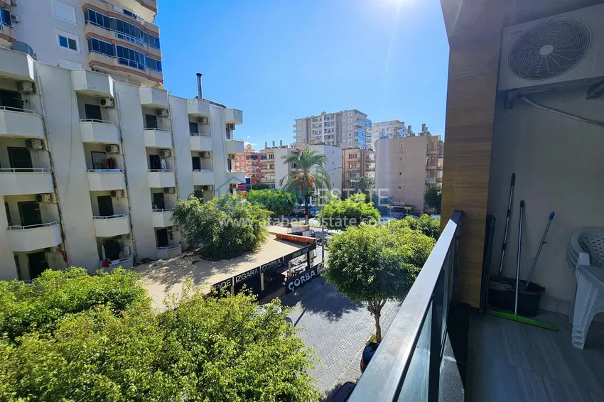 Приобрести Квартира 1+1 с мебелью в Махмутларе — 150 м от моря, проспект Барбаросса 18 