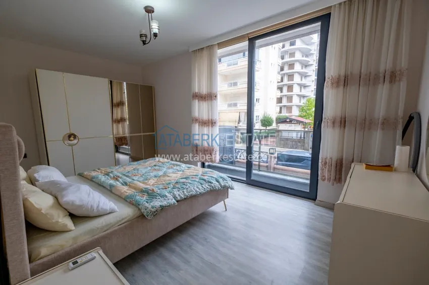 Приобрести Линейная квартира 3+1 с мебелью и отдельной кухней — в Алании, район Махмутлар 22 