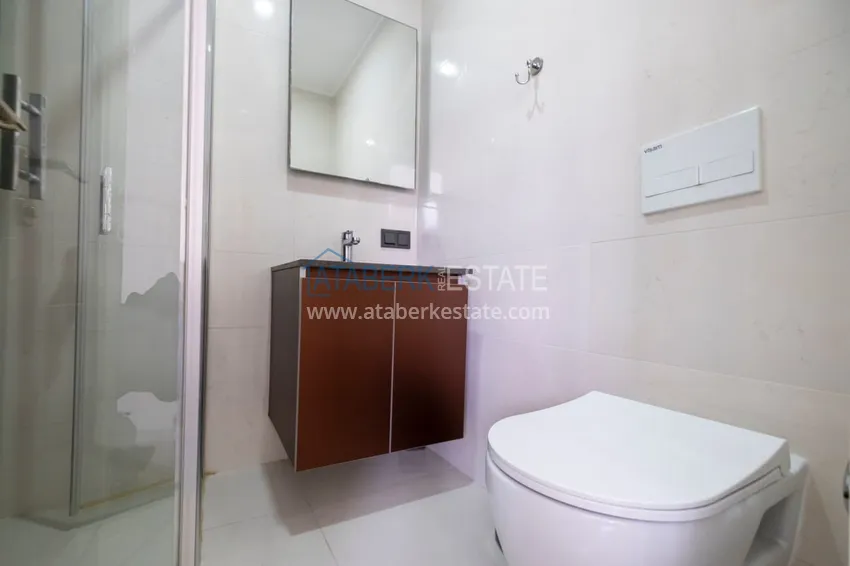 Приобрести Линейная квартира 3+1 с мебелью и отдельной кухней — в Алании, район Махмутлар 25 