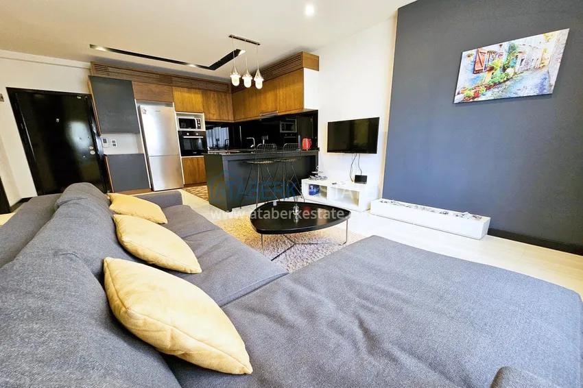 Приобрести Квартира 1+1 с мебелью в Махмутларе — 150 м от моря, проспект Барбаросса 4 