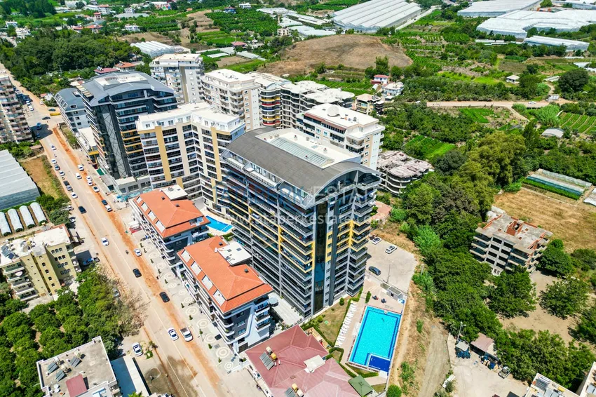 Линейная квартира 3+1 с мебелью и отдельной кухней — в Алании, район Махмутлар 4 