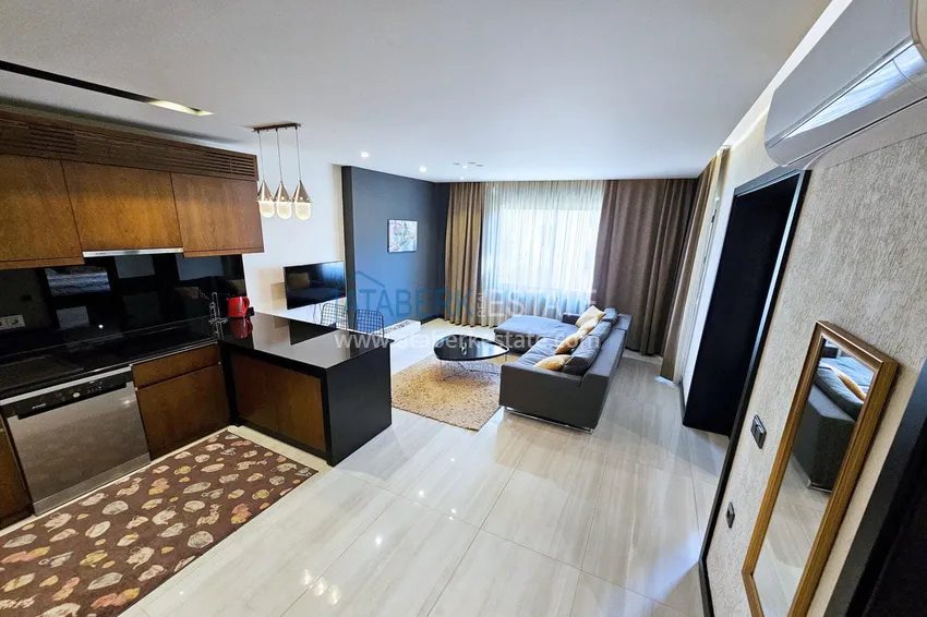 Приобрести Квартира 1+1 с мебелью в Махмутларе — 150 м от моря, проспект Барбаросса 5 