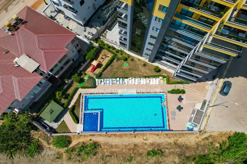 Линейная квартира 3+1 с мебелью и отдельной кухней — в Алании, район Махмутлар 5 