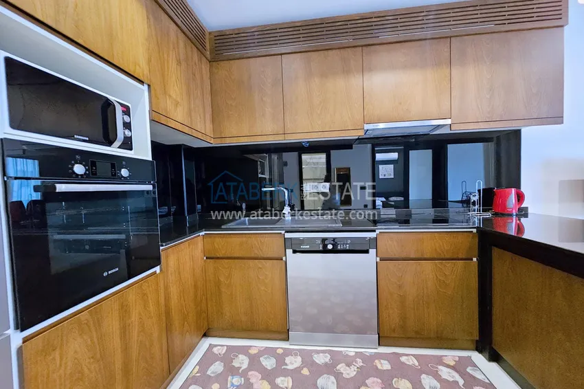 Приобрести Квартира 1+1 с мебелью в Махмутларе — 150 м от моря, проспект Барбаросса 6 