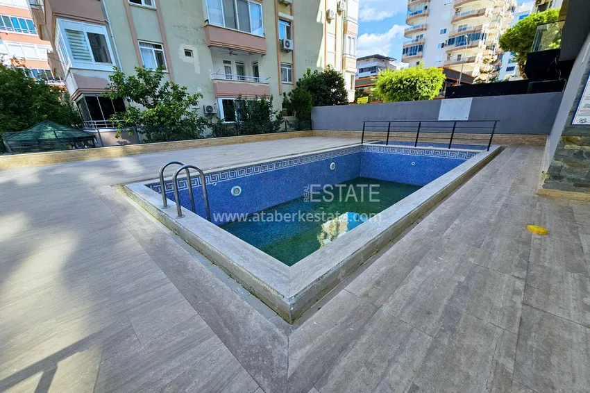 Квартира 1+1 с мебелью в Махмутларе — 150 м от моря, проспект Барбаросса 5 