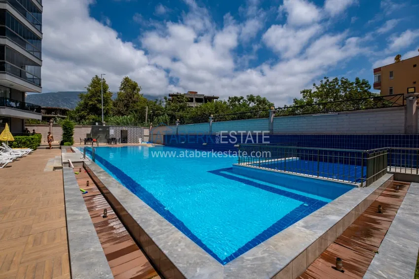 Линейная квартира 3+1 с мебелью и отдельной кухней — в Алании, район Махмутлар 6 