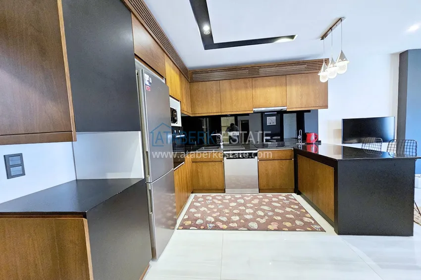 Приобрести Квартира 1+1 с мебелью в Махмутларе — 150 м от моря, проспект Барбаросса 7 