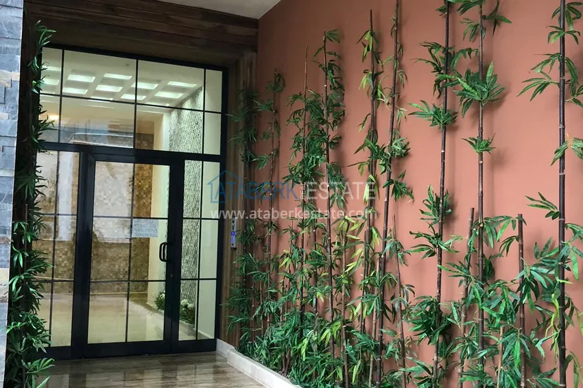 Квартира 1+1 с мебелью в Махмутларе — 150 м от моря, проспект Барбаросса 6 