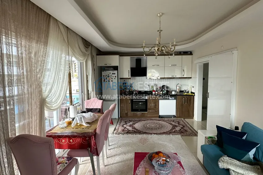 Приобрести Квартира 1+1 с видом на море и горы в Махмутларе - 300 от моря, продажа от собственника 16 