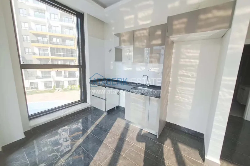 Приобрести Квартира 1+1 в центре Махмутлара - удачное сочетание локации и комфорта 5 