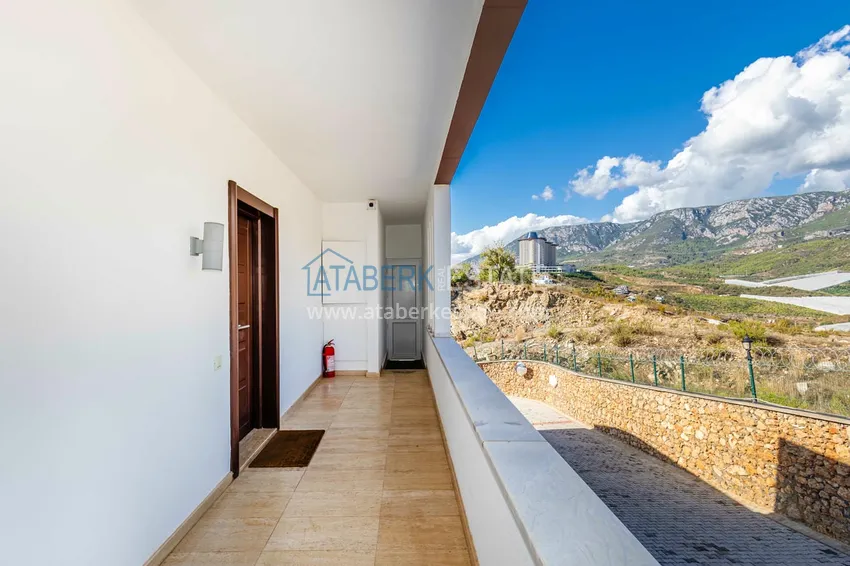 Элегантная вилла 3+1 с панорамным видом на море и горы в элитном комплексе – Алания, район Каргыджак 10 