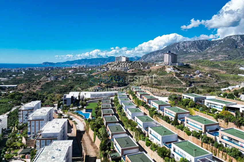 Элегантная вилла 3+1 с панорамным видом на море и горы в элитном комплексе – Алания, район Каргыджак 11 