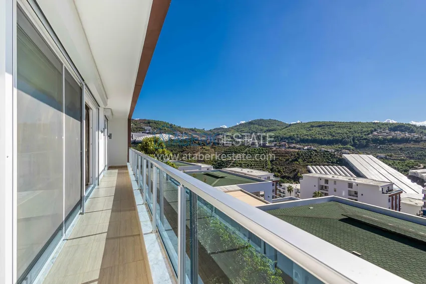 Приобрести Элегантная вилла 3+1 с панорамным видом на море и горы в элитном комплексе – Алания, район Каргыджак 11 