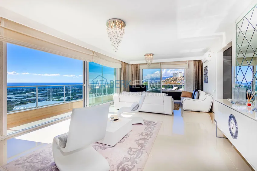 Приобрести Элегантная вилла 3+1 с панорамным видом на море и горы в элитном комплексе – Алания, район Каргыджак 1 