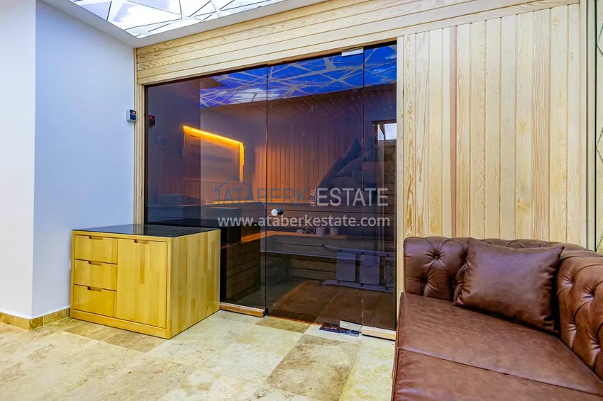 Приобрести Элегантная вилла 3+1 с панорамным видом на море и горы в элитном комплексе – Алания, район Каргыджак 24 