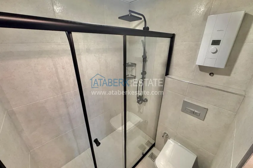 Приобрести Стильная квартира 1+1 в Оба - с дизайнерским интерьером и выгодной стоимостью 12 