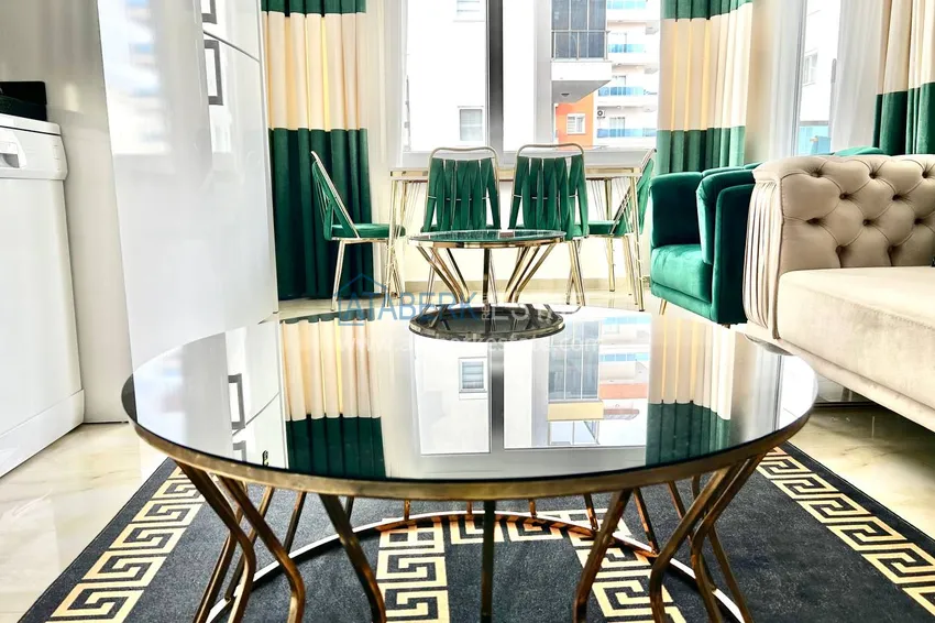 Приобрести Квартира 2+1 в Махмутларе меблированная рядом с морем - улица Барбаросса 11