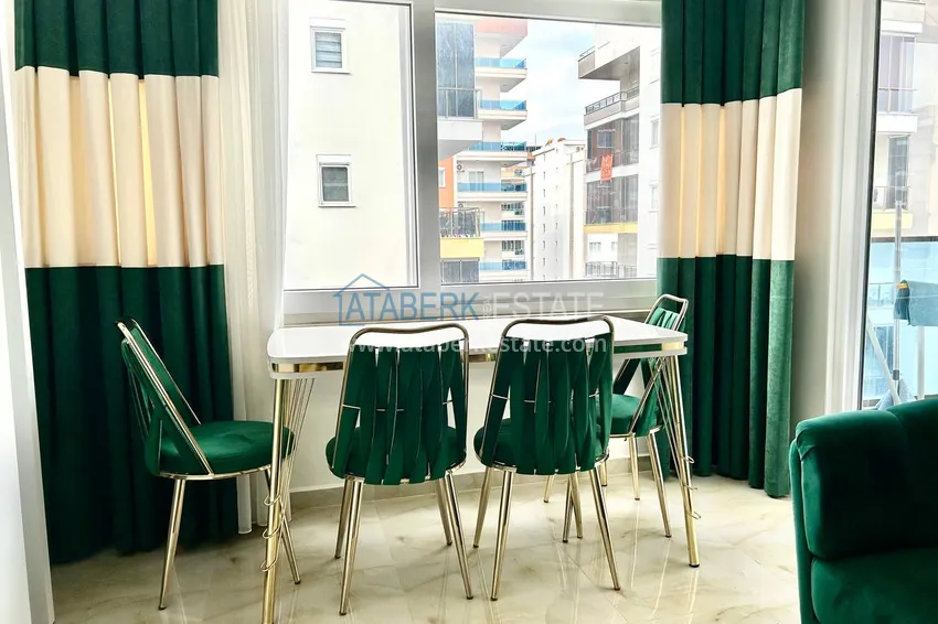 Приобрести Квартира 2+1 в Махмутларе меблированная рядом с морем - улица Барбаросса 12