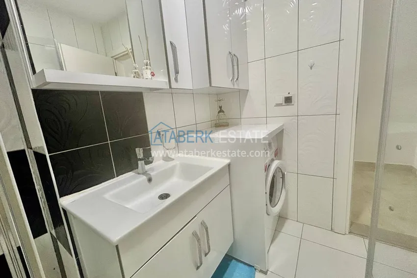 Приобрести Квартира 2+1 в Махмутларе меблированная рядом с морем - улица Барбаросса 21