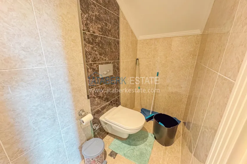 Приобрести Пентхаус 3+1 в Кестеле с мебелью и видом на горы - двухуровневая планировка и отдельная кухня 34