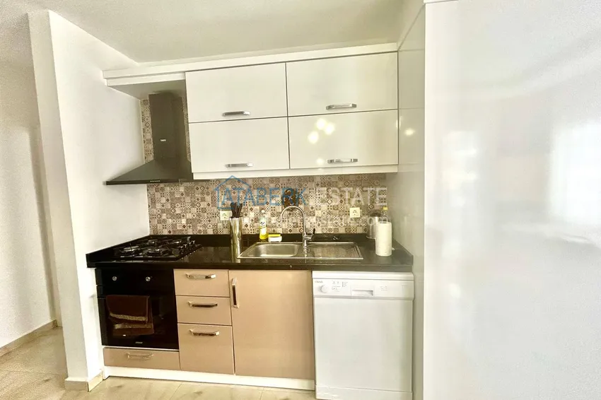 Приобрести Квартира 2+1 в Махмутларе меблированная рядом с морем - улица Барбаросса 5