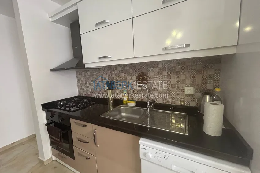 Приобрести Квартира 2+1 в Махмутларе меблированная рядом с морем - улица Барбаросса 6