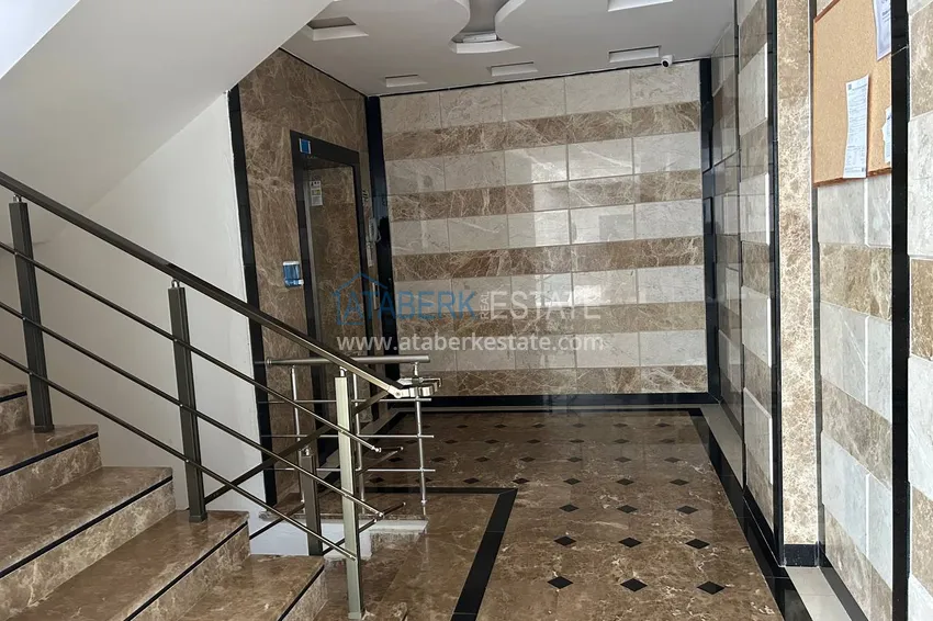 Квартира 2+1 в Махмутларе меблированная рядом с морем - улица Барбаросса 7