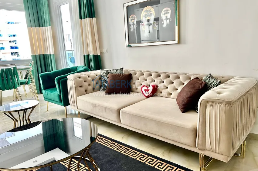 Приобрести Квартира 2+1 в Махмутларе меблированная рядом с морем - улица Барбаросса 7