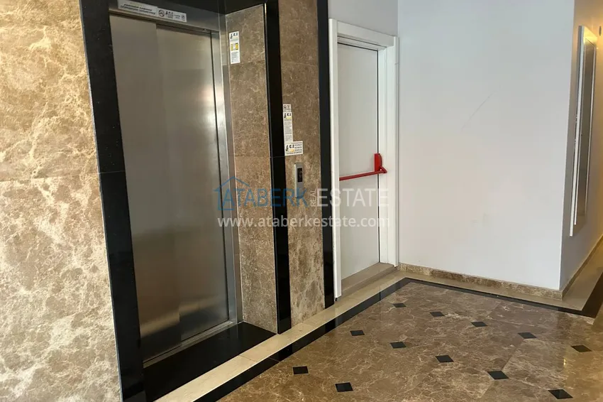 Квартира 2+1 в Махмутларе меблированная рядом с морем - улица Барбаросса 8