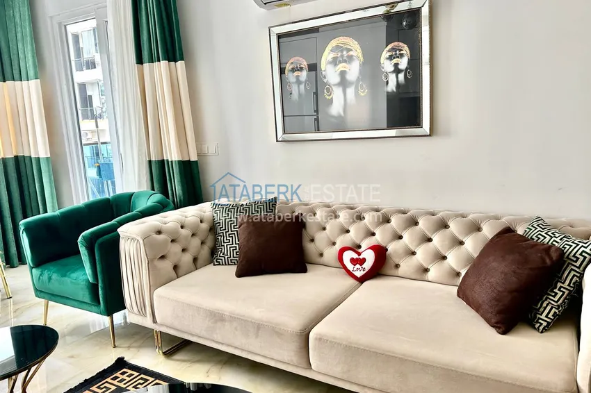 Приобрести Квартира 2+1 в Махмутларе меблированная рядом с морем - улица Барбаросса 8