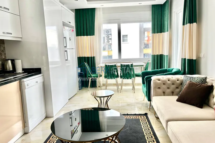 Приобрести Квартира 2+1 в Махмутларе меблированная рядом с морем - улица Барбаросса 9