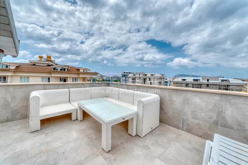 Приобрести Дуплекс 4+1 в Алании, район Оба - меблированный пентхаус под ВНЖ 21 