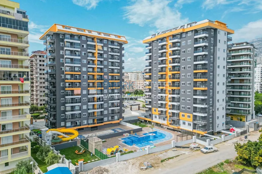 Квартира 2+1 в Алании, район Махмутлар - новая мебель и вид на море 1 