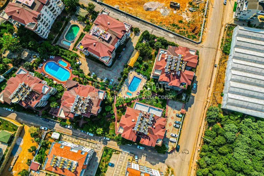 Дуплекс 4+1 в Алании, район Оба - меблированный пентхаус под ВНЖ 4 