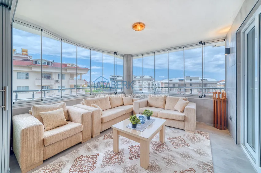 Приобрести Дуплекс 4+1 в Алании, район Оба - меблированный пентхаус под ВНЖ 6 