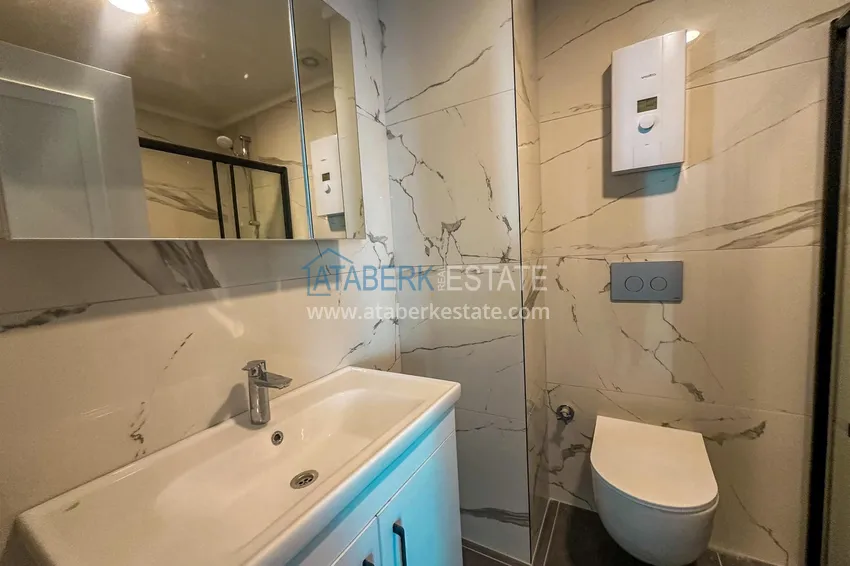 Приобрести Новый жилой комплекс в центре Алании, район пляжа Клеопатра - квартиры от застройщика 14