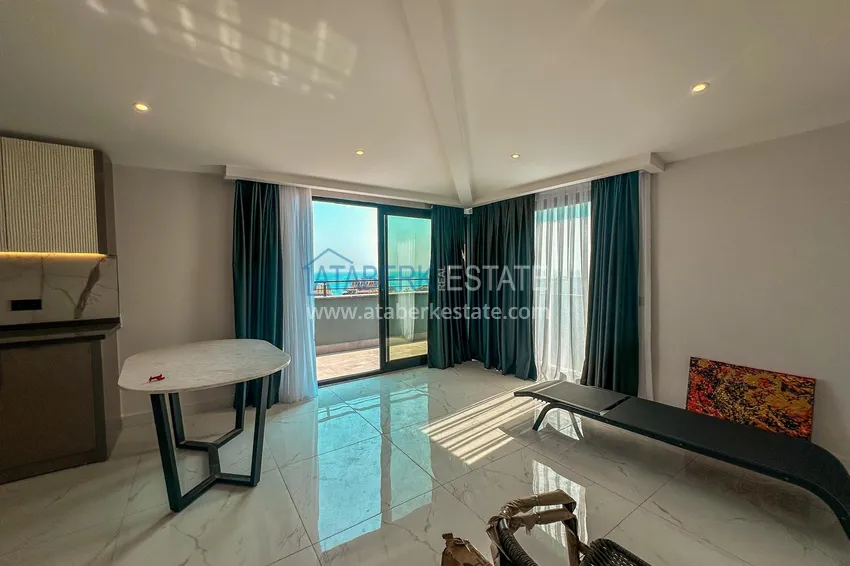 Приобрести Новый жилой комплекс в центре Алании, район пляжа Клеопатра - квартиры от застройщика 4