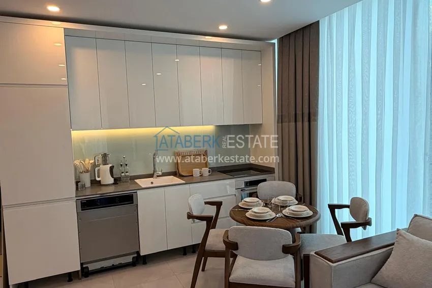 Приобрести Квартиры в комплекс-отеле 5 звезд с полным правом собственности и гибким графиком проживания – Алания, район Авсаллар 4 