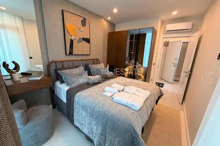 Приобрести Квартиры в комплекс-отеле 5 звезд с полным правом собственности и гибким графиком проживания – Алания, район Авсаллар 7 