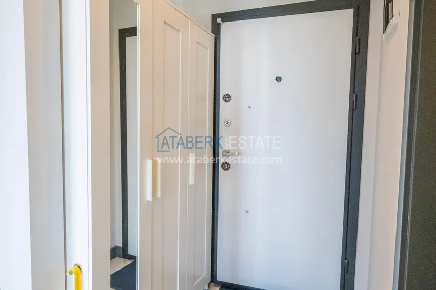 Приобрести Двухкомнатная квартира с новой мебелью в центр Махмутлара, район субботнего рынка 1 