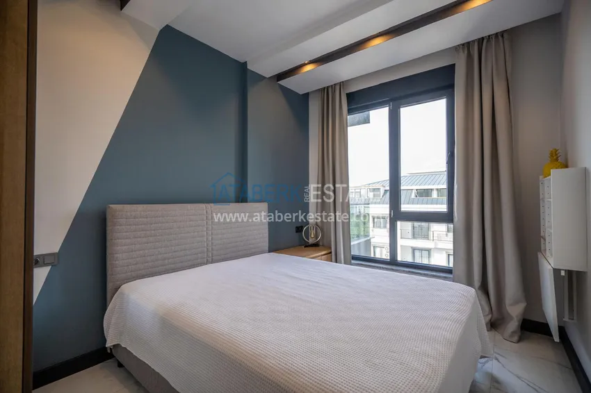 Приобрести Двухкомнатная квартира с новой мебелью в центр Махмутлара, район субботнего рынка 11 