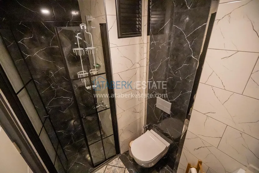 Приобрести Двухкомнатная квартира с новой мебелью в центр Махмутлара, район субботнего рынка 16 