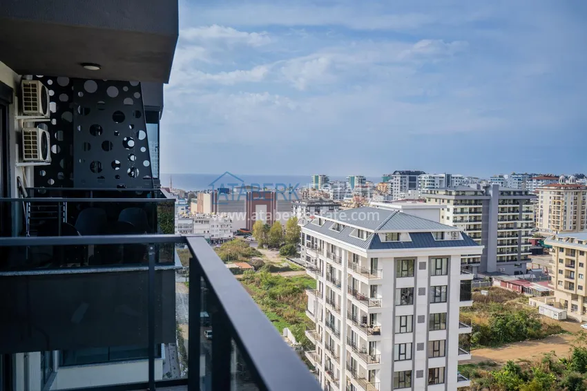 Приобрести Двухкомнатная квартира с новой мебелью в центр Махмутлара, район субботнего рынка 20 