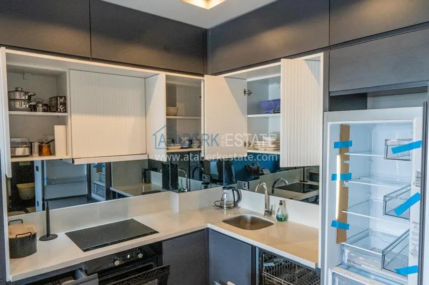 Приобрести Двухкомнатная квартира с новой мебелью в центр Махмутлара, район субботнего рынка 5 