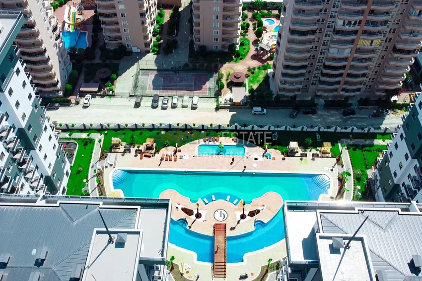 Квартира 1+1 в Алании, Махмутлар - с мебелью в комплексе курортного уровня  4 
