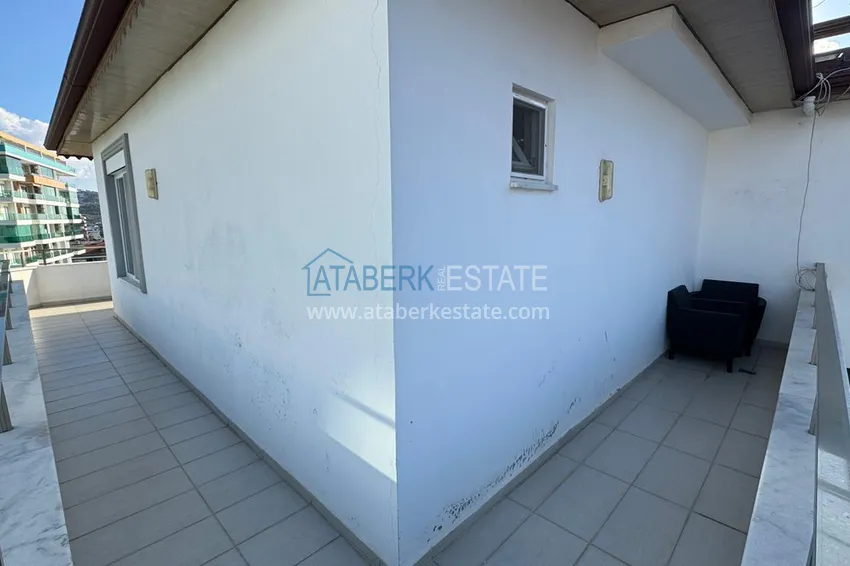 Приобрести Видовой пентхаус с мебелью в комплексе на центральной улице района Махмутлар 15 